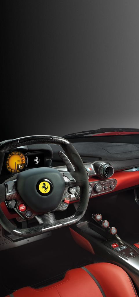 LaFerrari is Ferrari’s most ambitious project. It boasts the most extreme performance ever achieved by a Ferrari production car and features the most advanced and innovative technical solutions which will, in the future, filter down to the rest of the Ferrari range. The LaFerrari is Ferrari’s first ever production car to be equipped with the F1-derived hybrid solution – the HY-KERS system – which combines an electric motor producing over 150 CV with the most powerful incarnation yet of Ferrari’s classic V12, with 800 CV at 9000 rpm.